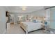 Spacious main bedroom with a large bed, sitting area, and ensuite bathroom access at 1317 Longleaf Ct, Matthews, NC 28104