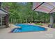 Backyard pool with an expansive deck perfect for outdoor entertaining at 1317 Longleaf Ct, Matthews, NC 28104