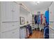 Walk-in closet with custom shelving and ample storage space for clothing and accessories at 1317 Longleaf Ct, Matthews, NC 28104
