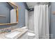 Bathroom with granite countertop, white vanity, shower and tub combination with neutral decor at 138 Ardmore Pl, Mooresville, NC 28117