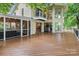 Large deck with screened in porch with outdoor seating and entertaining space at 138 Ardmore Pl, Mooresville, NC 28117