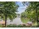 Waterfront view of the lake with docks from the property at 138 Ardmore Pl, Mooresville, NC 28117