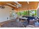 Screened-in porch with outdoor dining and lounge area, perfect for entertaining at 138 Ardmore Pl, Mooresville, NC 28117