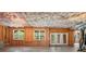 Unfinished basement with natural light, framed walls, and a door leading to the outside at 14746 Greenpoint Ln, Huntersville, NC 28078