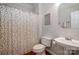 Cozy bathroom featuring classic fixtures, a shower curtain, and a well-lit mirror at 14746 Greenpoint Ln, Huntersville, NC 28078