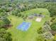 Aerial view of basketball court, sand volleyball, playground, green space, and gazebo at 14746 Greenpoint Ln, Huntersville, NC 28078