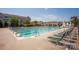 Outdoor community pool with lane dividers, lounge chairs, and a covered area with tables at 14746 Greenpoint Ln, Huntersville, NC 28078