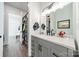 Stylish bathroom with double sink vanity, modern fixtures, and plenty of storage space at 1543 Withers Dr, Denver, NC 28037
