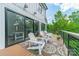 Cozy outdoor deck features lounge chairs, throw pillows, and scenic views at 1543 Withers Dr, Denver, NC 28037