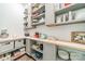 Well-organized pantry with custom shelving and wood countertop provides ample storage at 1543 Withers Dr, Denver, NC 28037