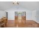 Spacious living room with hardwood floors, high ceilings, and views into the living room and entryway at 173 Riverwood Rd, Mooresville, NC 28117