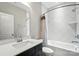 Sleek bathroom with a modern vanity, stylish tile, and a shower-tub combination at 1908 Masons Bend Dr, Fort Mill, SC 29708