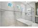 The frameless shower features dual shower heads, built-in bench, and bright natural light at 1908 Masons Bend Dr, Fort Mill, SC 29708