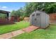 Backyard featuring a storage shed, a gazebo, a fenced yard, and a pathway leading to a patio at 231 Anvil Draw Pl, Rock Hill, SC 29730