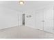 Bright carpeted bedroom with neutral walls, and a closet with double doors at 231 Anvil Draw Pl, Rock Hill, SC 29730