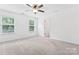 Bright bedroom featuring carpet, ceiling fan and natural light at 231 Anvil Draw Pl, Rock Hill, SC 29730