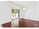Dining room features wood floors, sliding glass doors, and natural light at 231 Anvil Draw Pl, Rock Hill, SC 29730
