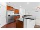 Kitchen featuring stainless steel refrigerator, granite countertops, and cherry cabinets at 231 Anvil Draw Pl, Rock Hill, SC 29730