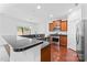 Kitchen featuring stainless steel appliances, cherry cabinets and granite countertops at 231 Anvil Draw Pl, Rock Hill, SC 29730