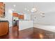 View of kitchen with stainless steel appliances and granite countertops, open to living room at 231 Anvil Draw Pl, Rock Hill, SC 29730