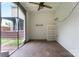 Interior of screened outbuilding with storage shelves and access to deck at 231 Anvil Draw Pl, Rock Hill, SC 29730