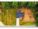 A lovely aerial view of the home with a driveway at 236 Mark Ryan Ln, Dallas, NC 28034