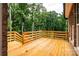 Decking area with railing and view of treeline at 236 Mark Ryan Ln, Dallas, NC 28034