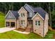 Stunning two-story brick home with a well-manicured lawn and inviting front entrance at 236 Mark Ryan Ln, Dallas, NC 28034