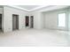 Spacious living area with three doorway openings and a large window offering natural light at 236 Mark Ryan Ln, Dallas, NC 28034