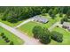 Spacious property showcasing a well-maintained home, lush landscaping, and an expansive driveway at 250 Wesley Amaker Rd, York, SC 29745