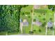 Aerial view of houses with large yards surrounded by lush greenery and mature trees at 250 Wesley Amaker Rd, York, SC 29745