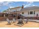 Backyard area featuring a fire pit surrounded by chairs, perfect for outdoor gatherings at 250 Wesley Amaker Rd, York, SC 29745