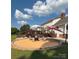 Backyard with patio, fire pit, and deck providing ample space for relaxation and recreation at 250 Wesley Amaker Rd, York, SC 29745