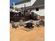 Backyard patio featuring Adirondack chairs and fire pit for outdoor enjoyment at 250 Wesley Amaker Rd, York, SC 29745