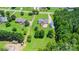 Large, grassy backyard with a patio, a storage shed, and mature trees, offering a private outdoor space at 250 Wesley Amaker Rd, York, SC 29745