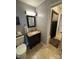 Cozy bathroom with tile floor, granite vanity, mirror and toilet for everyday convenience at 250 Wesley Amaker Rd, York, SC 29745