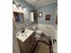 Stylish half-bathroom with modern fixtures, vanity, and decorative accents at 250 Wesley Amaker Rd, York, SC 29745