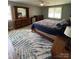 Bright bedroom with a large window and wooden furniture at 250 Wesley Amaker Rd, York, SC 29745