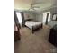 Bedroom with carpet, ceiling fan and two windows providing plenty of light at 250 Wesley Amaker Rd, York, SC 29745