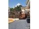 Multi-level wooden deck with stairs, seating, and grill perfect for outdoor gatherings at 250 Wesley Amaker Rd, York, SC 29745