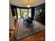 Charming dining room with a classic rug, a round table, and a bay window at 250 Wesley Amaker Rd, York, SC 29745
