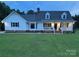 Charming two-story home with a well-manicured lawn and covered porch at 250 Wesley Amaker Rd, York, SC 29745