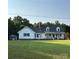 Beautiful two-story home with a spacious front lawn, covered porch, and a shed in the backyard at 250 Wesley Amaker Rd, York, SC 29745