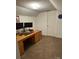 Functional home office space features a large desk and carpet offering a quiet space for work or study at 250 Wesley Amaker Rd, York, SC 29745