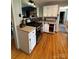 Modern kitchen with stainless steel appliances, white cabinets, and granite countertops at 250 Wesley Amaker Rd, York, SC 29745