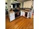 Updated kitchen with stainless steel appliances, white cabinets, and granite countertops at 250 Wesley Amaker Rd, York, SC 29745