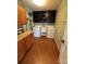 Functional laundry room with ample cabinet space and a utility sink at 250 Wesley Amaker Rd, York, SC 29745