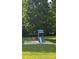 Backyard playground with swings and a slide for outdoor activities at 250 Wesley Amaker Rd, York, SC 29745