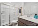 Modern bathroom featuring a glass-enclosed shower, toilet, vanity with a sink and white countertops at 4148 Alexander View Dr, Charlotte, NC 28226