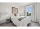 Bright bedroom with natural light, neutral decor, and stylish accents, offering a peaceful and inviting space at 4148 Alexander View Dr, Charlotte, NC 28226